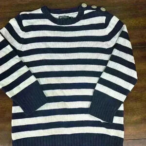 Women’s size large sweater with buttons on shoulder. Runs small. Fits like M.